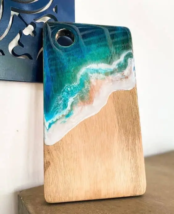 Resin and cutting board