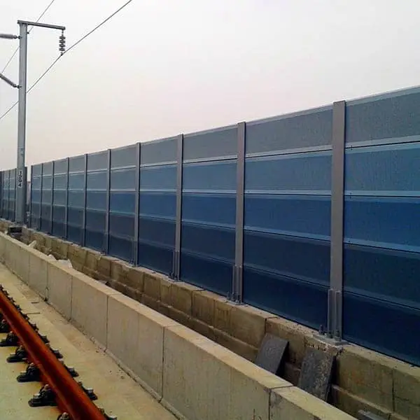 Metal noise barriers on both sides of the railway